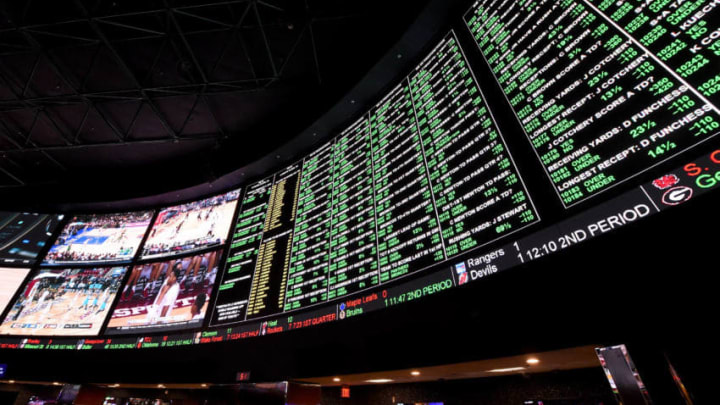 LAS VEGAS, NV - FEBRUARY 02: The betting line and some of the nearly 400 proposition bets for Super Bowl 50 between the Carolina Panthers and the Denver Broncos are displayed at the Race & Sports SuperBook at the Westgate Las Vegas Resort & Casino on February 2, 2016 in Las Vegas, Nevada. The newly renovated sports book has the world's largest indoor LED video wall with 4,488 square feet of HD video screens measuring 240 feet wide and 20 feet tall. (Photo by Ethan Miller/Getty Images)