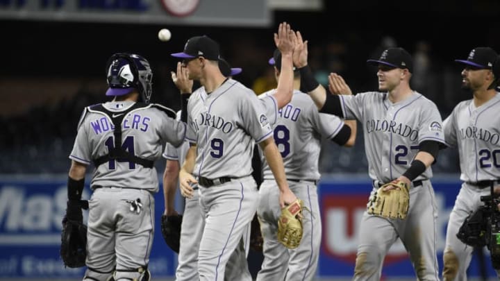SAN DIEGO, CA - SEPTEMBER 22: Colorado Rockies players celebrate after beating the San Diego Padres 4-1 in a baseball game at PETCO Park on September 22, 2017 in San Diego, California. (Photo by Denis Poroy/Getty Images)