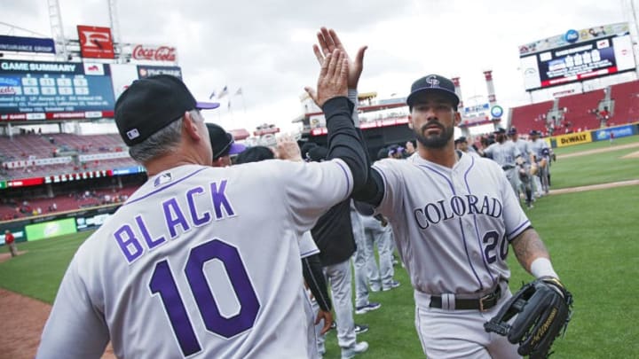 CINCINNATI, OH - MAY 21: Colorado Rockies manager Bud Black celebrates with Ian Desmond #20 after the final out in the ninth inning of a game against the Cincinnati Reds at Great American Ball Park on May 21, 2017 in Cincinnati, Ohio. The Rockies defeated the Reds 6-4. (Photo by Joe Robbins/Getty Images)