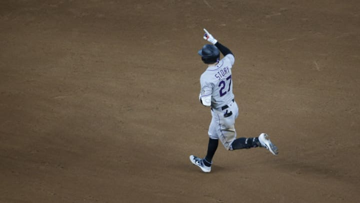 Jul 26, 2020; Arlington, Texas, USA; Colorado Rockies shortstop Trevor Story (27) reacts after hitting his second home run in the sixth inning against the Texas Rangers at Globe Life Field. Mandatory Credit: Tim Heitman-USA TODAY Sports