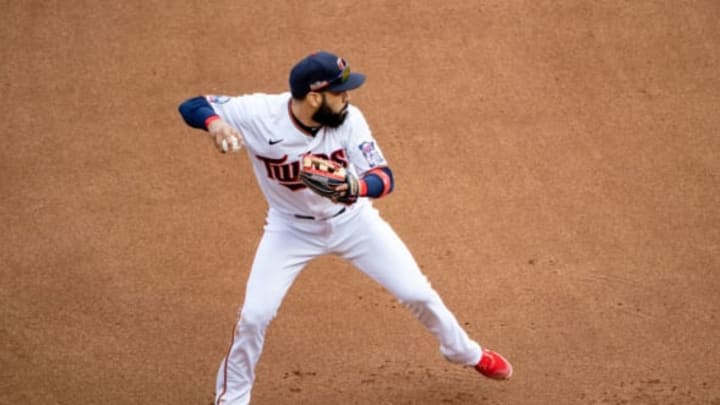Sep 29, 2020; Minneapolis, Minnesota, USA; Minnesota Twins third baseman Marwin Gonzalez (9) throws the ball to first base in the seventh inning against the Houston Astros at Target Field. Mandatory Credit: Jesse Johnson-USA TODAY Sports