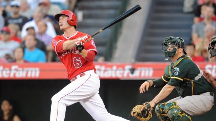 September 30, 2015; Anaheim, CA, USA; Los Angeles Angels third baseman David Freese (6) hits a solo home run in the fourth inning against the Oakland Athletics at Angel Stadium of Anaheim. Mandatory Credit: Gary A. Vasquez-USA TODAY Sports