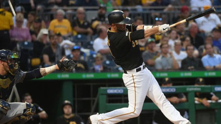 PITTSBURGH, PA - AUGUST 07: Jacob Stallings #58 of the Pittsburgh Pirates hits a home run in the third inning during the game against the Milwaukee Brewers at PNC Park on August 7, 2019 in Pittsburgh, Pennsylvania. (Photo by Justin Berl/Getty Images)