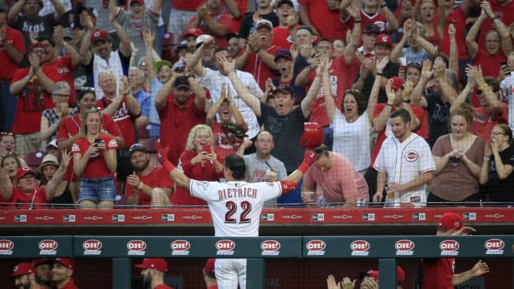CINCINNATI, OHIO - MAY 28: Derek Dietrich #22 of the Cincinnati Reds takes a curtain call after hitting a two run home run in the 7th inning against the Pittsburgh Pirates at Great American Ball Park on May 28, 2019 in Cincinnati, Ohio. (Photo by Andy Lyons/Getty Images)