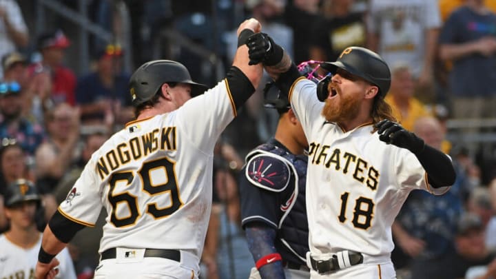 PITTSBURGH, PA - JULY 05: Ben Gamel #18 of the Pittsburgh Pirates celebrates with John Nogowski #69 after hitting a two run home run in the fourth inning during the game against the Atlanta Braves at PNC Park on July 5, 2021 in Pittsburgh, Pennsylvania. (Photo by Justin Berl/Getty Images)