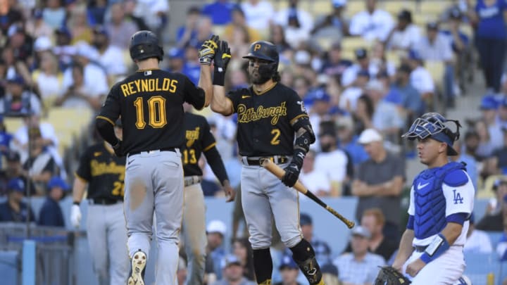 LOS ANGELES, CA - JUNE 01: Bryan Reynolds #10 of the Pittsburgh Pirates celebrates his two-run home run with Michael Chavis #2 against starting pitcher Mitch White of the Los Angeles Dodgers in the fifth inning at Dodger Stadium on June 1, 2022 in Los Angeles, California. (Photo by Kevork Djansezian/Getty Images)