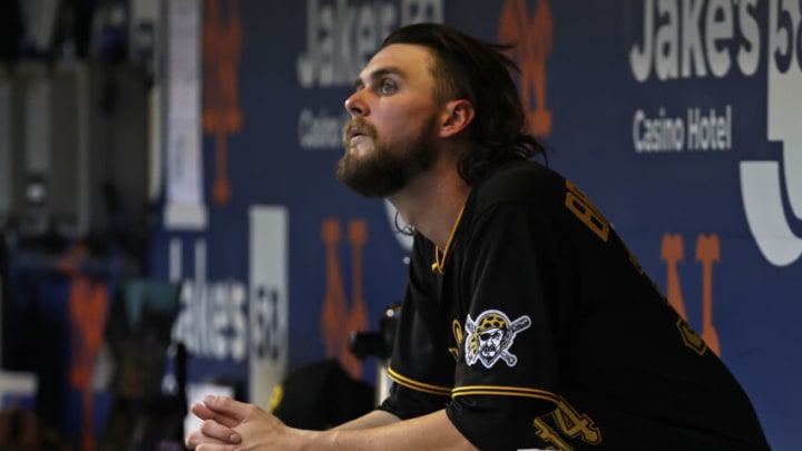 NEW YORK, NY - JULY 9: JT Brubaker #34 of the Pittsburgh Pirates in the dugout before taking on the New York Mets at Citi Field on July 9, 2021 in the Flushing neighborhood of the Queens borough of New York City. (Photo by Adam Hunger/Getty Images)