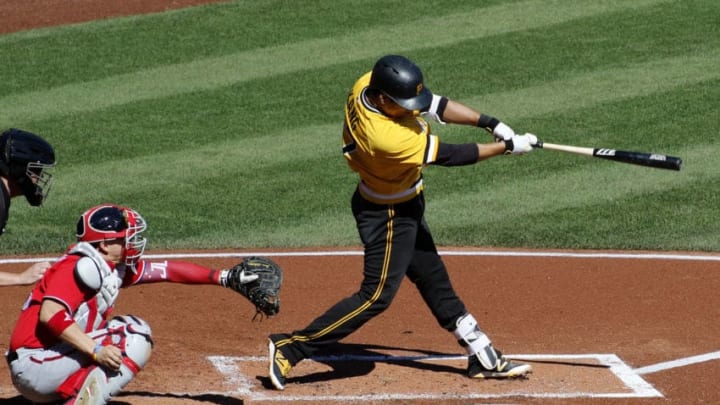 PITTSBURGH, PA - SEPTEMBER 25: Jung Ho Kang #27 of the Pittsburgh Pirates hits a RBI single in the first inning during the game against the Washington Nationals at PNC Park on September 25, 2016 in Pittsburgh, Pennsylvania. (Photo by Justin K. Aller/Getty Images)