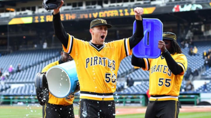 PITTSBURGH, PA – APRIL 08: Jameson Taillon #50 is doused with Powerade and bubble gum by Starling Marte #6 and Josh Bell #55 of the Pittsburgh Pirates after throwing a complete game shutout against the Cincinnati Reds at PNC Park on April 8, 2018 in Pittsburgh, Pennsylvania. (Photo by Joe Sargent/Getty Images)