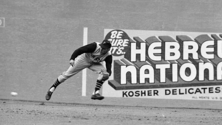 NEW YORK, NY - APRIL 13: Dick Groat #24 of the Pittsburgh Pirates fielding during a MLB game against the New York Mets on April 13, 1962 in New York, New York. (Photo by Herb Scharfman/Sports Imagery/Getty Images)