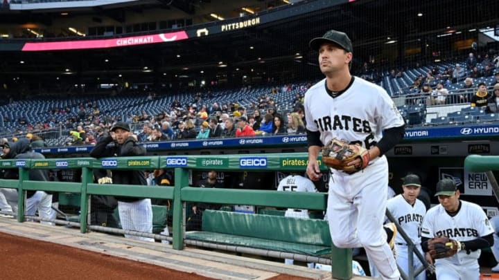 PITTSBURGH, PA - APRIL 04: Adam Frazier #26 of the Pittsburgh Pirates runs onto the field for the start of the first inning in the game against the Cincinnati Reds at PNC Park on April 4, 2019 in Pittsburgh, Pennsylvania. (Photo by Justin Berl/Getty Images)