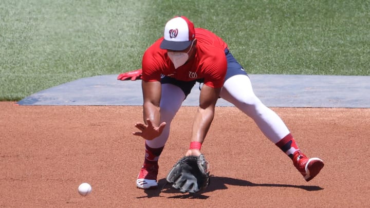 Jul 9, 2020; Washington, DC, United States; Washington Nationals shortstop Wilmer Difo fields a ground ball on day seven of Nationals workouts at Nationals Park. Mandatory Credit: Geoff Burke-USA TODAY Sports