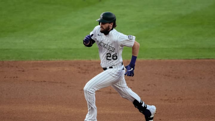 Aug 4, 2020; Denver, Colorado, USA; Colorado Rockies center fielder David Dahl (26) runs to third on a triple in the first inning against the San Francisco Giants at Coors Field. Mandatory Credit: Isaiah J. Downing-USA TODAY Sports