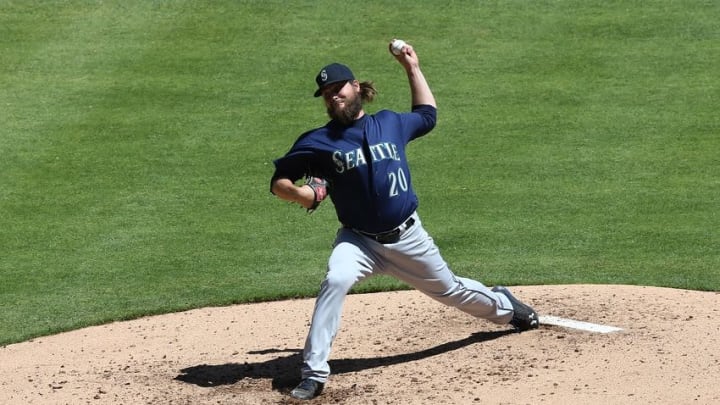 Apr 6, 2016; Arlington, TX, USA; Seattle Mariners starting pitcher Wade Miley (20) throws a pitch in the third inning against the Texas Rangers at Globe Life Park in Arlington. Mandatory Credit: Matthew Emmons-USA TODAY Sports