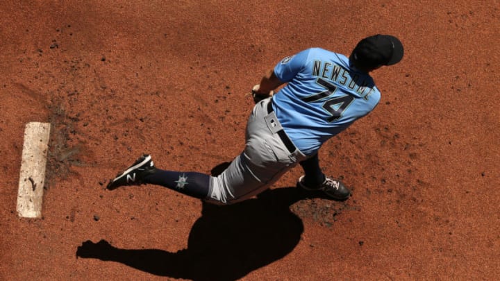 SEATTLE, WASHINGTON - JULY 13: Ljay Newsome of the Seattle Mariners warms up prior. (Photo by Abbie Parr/Getty Images)