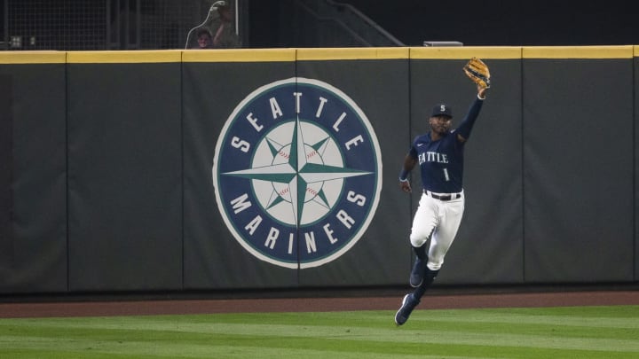 Kyle Lewis of the Seattle Mariners celebrates after robbing a home run.