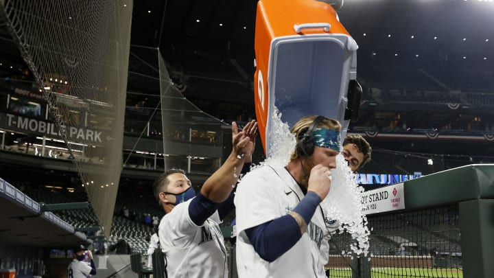 Jake Fraley of the Mariners gets doused.