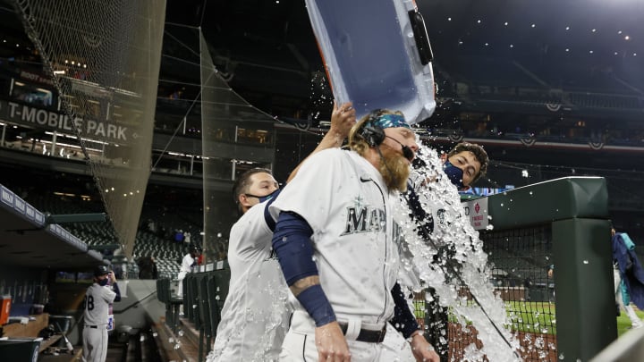 Jake Fraley of the Mariners celebrates after defeating the Giants.