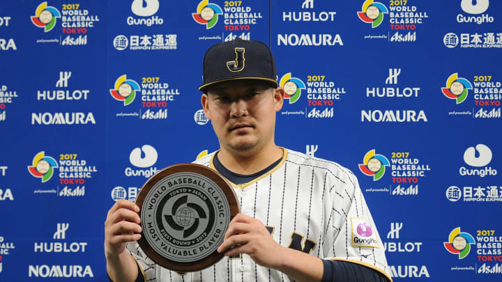 TOKYO, JAPAN – MARCH 10: Outfielder Yoshitomo Tsutsugoh #25 of Japan is awarded the Most Valuable Player award for the Frist Round Pool B after the World Baseball Classic Pool B Game Six between China and Japan at Tokyo Dome on March 10, 2017 in Tokyo, Japan. (Photo by Matt Roberts/Getty Images)
