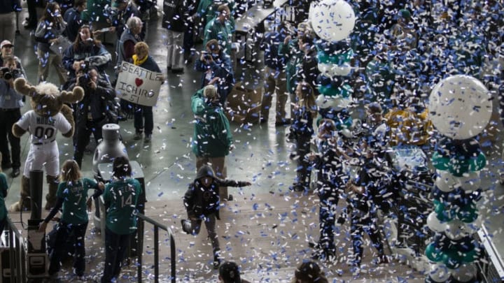 SEATTLE, WA - MARCH 29: As confetti rains down, fans make their way into the stadium before a game on opening day between the Cleveland Indians and the Seattle Mariners at Safeco Field on March 29, 2018 in Seattle, Washington. (Photo by Stephen Brashear/Getty Images)