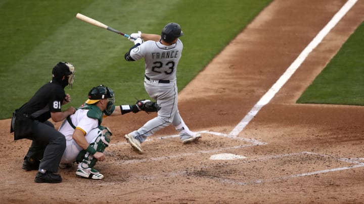 Ty France of the Seattle Mariners hits a double.