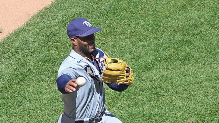 CHICAGO, ILLINOIS - JUNE 16: Yandy Diaz #2 of the Tampa Bay Rays commits a throwing error in the 5th inning on a bunt by Brian Goodwin of the Chicago White Sox at Guaranteed Rate Field on June 16, 2021 in Chicago, Illinois. (Photo by Jonathan Daniel/Getty Images)