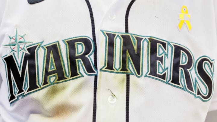 SEATTLE, WASHINGTON - SEPTEMBER 01: The jersey of J.P. Crawford #3 of the Seattle Mariners is seen on "Childhood Cancer Awareness Day" against the Houston Astros at T-Mobile Park on September 01, 2021 in Seattle, Washington. (Photo by Steph Chambers/Getty Images)