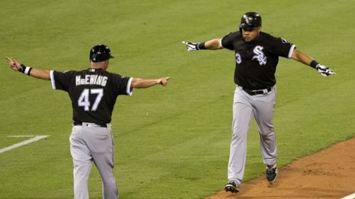 Sep 20, 2016; Philadelphia, PA, USA; Chicago White Sox left fielder Melky Cabrera (53) reacts with third base coach Joe McEwing (47) after hitting a three RBI home run against the Philadelphia Phillies during the third inning at Citizens Bank Park. Mandatory Credit: Bill Streicher-USA TODAY Sports