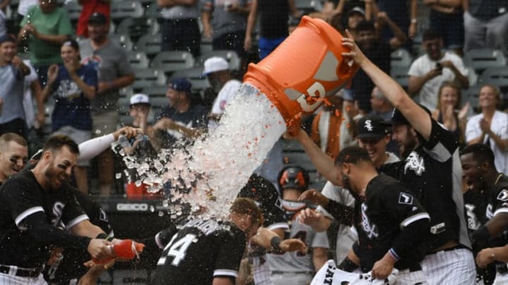 CHICAGO, IL - SEPTEMBER 03: Matt Davidson #24 of the Chicago White Soxis greeted by his teammates after hitting a two-run walk-off home run against the Detroit Tigers during the ninth inning on September 3, 2018 at Guaranteed Rate Field in Chicago, Illinois. The White Sox won 4-2. (Photo by David Banks/Getty Images)