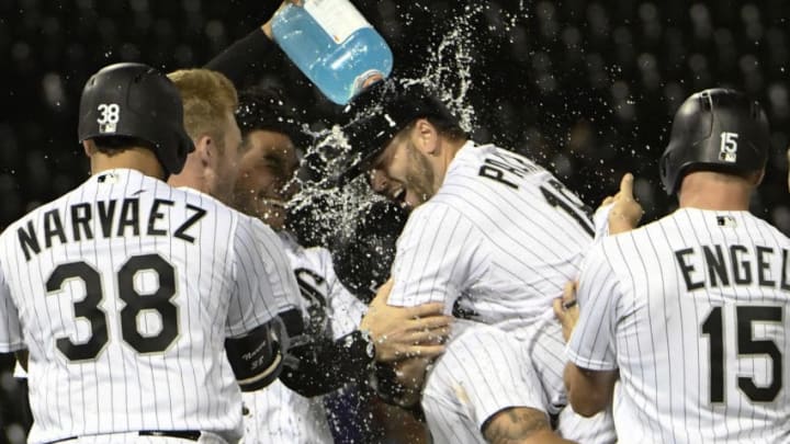 CHICAGO, IL - SEPTEMBER 25: Daniel Palka #18 of the Chicago White Sox is mobbed by his teammates after hitting a two-run game winning single against the Cleveland Indians during the ninth inning on September 25, 2018 at Guaranteed Rate Field in Chicago, Illinois. The White Sox won 5-4.(Photo by David Banks/Getty Images)