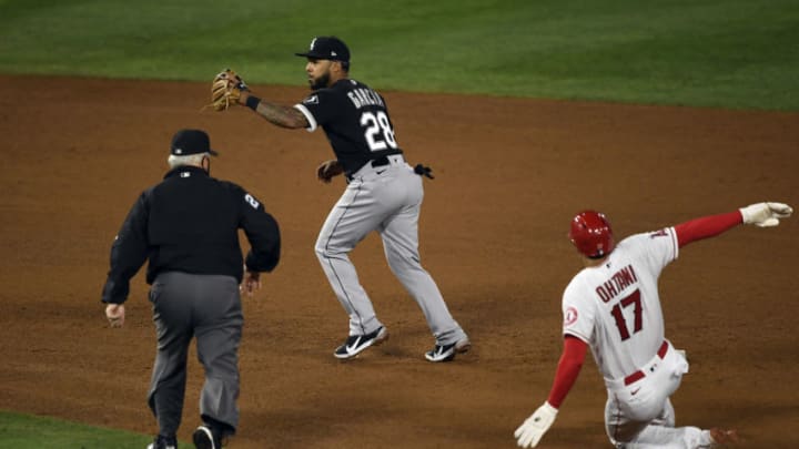ANAHEIM, CA - APRIL 03: Leury Garcia #28 of the Chicago White Sox catches a wide throw as Shohei Ohtani #17 of the Los Angeles Angels steals second base during the fifth inning at Angel Stadium of Anaheim on April 3, 2021 in Anaheim, California. (Photo by Kevork Djansezian/Getty Images)