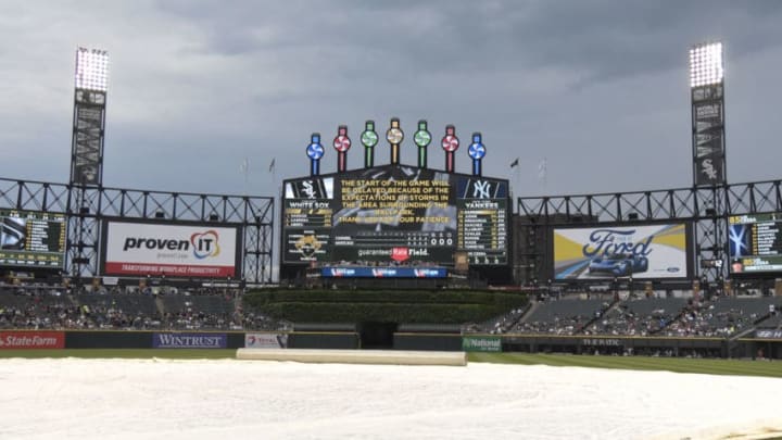 CHICAGO, IL - JUNE 29: A tarp cover the field as the start of the game between the Chicago White Sox and the New York Yankees is delayed because of the weather on June 29, 2017 at Guaranteed Rate Field in Chicago, Illinois. (Photo by David Banks/Getty Images)