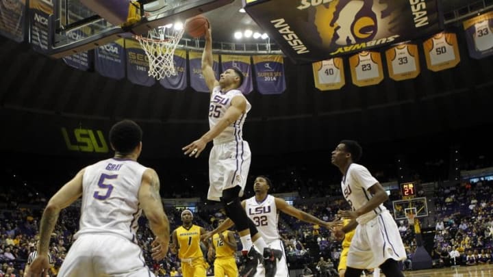 Mar 1, 2016; Baton Rouge, LA, USA; LSU Tigers forward Ben Simmons (25) goes up to dunk the ball during the first half against the Missouri Tigers at the Pete Maravich Assembly Center. LSU defeated Missouri 80-71. Mandatory Credit: Crystal LoGiudice-USA TODAY Sports