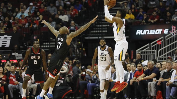 PJ Tucker of the Houston Rockets defends Donovan Mitchell of the Utah Jazz (Photo by Tim Warner/Getty Images)