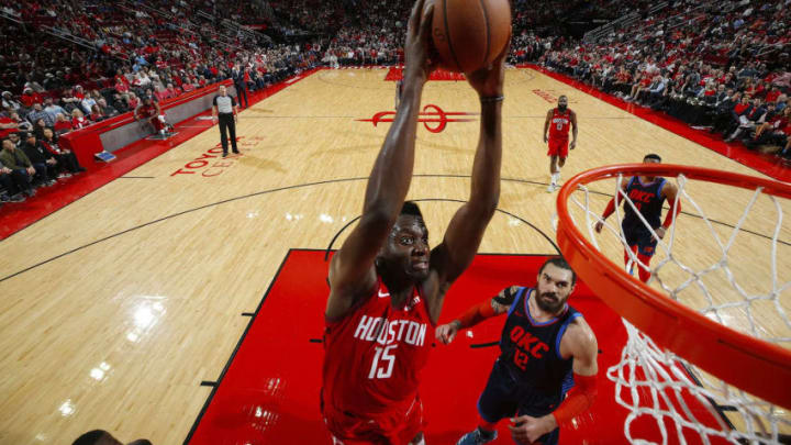 HOUSTON, TX - DECEMBER 25: Clint Capela #15 of the Houston Rockets dunks the ball during the game against the Oklahoma City Thunder on December 25, 2018 at the Toyota Center in Houston, Texas. NOTE TO USER: User expressly acknowledges and agrees that, by downloading and or using this photograph, User is consenting to the terms and conditions of the Getty Images License Agreement. Mandatory Copyright Notice: Copyright 2018 NBAE (Photo by Jeff Haynes/NBAE via Getty Images)