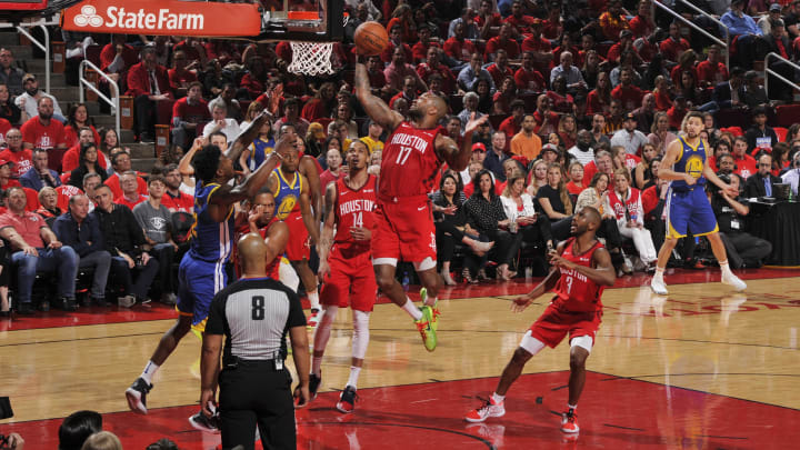PJ Tucker #17 of the Houston Rockets grabs the rebound against the Golden State Warriors