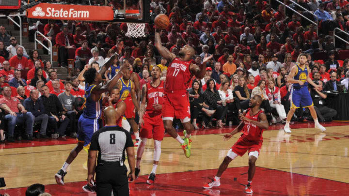 PJ Tucker #17 of the Houston Rockets grabs the rebound against the Golden State Warriors (Photo by Bill Baptist/NBAE via Getty Images)