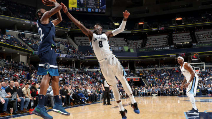 MEMPHIS, TN - DECEMBER 4: Andrew Wiggins #22 of the Minnesota Timbewolves shoots the ball as James Ennis III #8 of the Memphis Grizzlies attempts to block during the game between the two teams on December 4, 2017 at FedEx Forum in Memphis, Tennessee. NOTE TO USER: User expressly acknowledges and agrees that, by downloading and/or using this photograph, user is consenting to the terms and conditions of the Getty Images License Agreement. Mandatory Copyright Notice: Copyright 2017 NBAE (Photo by Joe Murphy/NBAE via Getty Images)