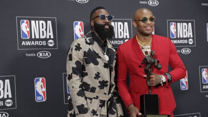 James Harden #13 of the Houston Rockets poses for a photo with PJ Tucker #4 of the Houston Rockets (Photo by Will Navarro/NBAE via Getty Images)