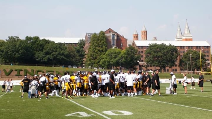 Jul 27, 2015; Latrobe, PA, USA; The Pittsburgh Steelers huddle on the field during training camp at Saint Vincent College. Mandatory Credit: Charles LeClaire-USA TODAY Sports