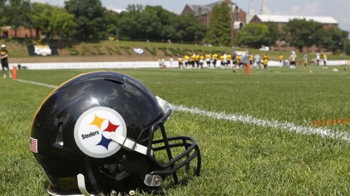 Jul 27, 2015; Latrobe, PA, USA; General view as Pittsburgh Steelers helmet sits on the field during training camp at Saint Vincent College. Mandatory Credit: Charles LeClaire-USA TODAY Sports