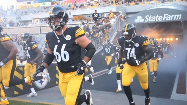 Aug 18, 2016; Pittsburgh, PA, USA; Pittsburgh Steelers guard David DeCastro (66) and guard Chris Hubbard (74) take the field to play the Philadelphia Eagles at Heinz Field. The Eagles won 17-0. Mandatory Credit: Charles LeClaire-USA TODAY Sports