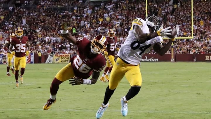 Sep 12, 2016; Landover, MD, USA; Pittsburgh Steelers wide receiver Antonio Brown (84) catches a touchdown pass as Washington Redskins cornerback Bashaud Breeland (26) defends in the third quarter at FedEx Field. The Steelers won 38-16. Mandatory Credit: Geoff Burke-USA TODAY Sports