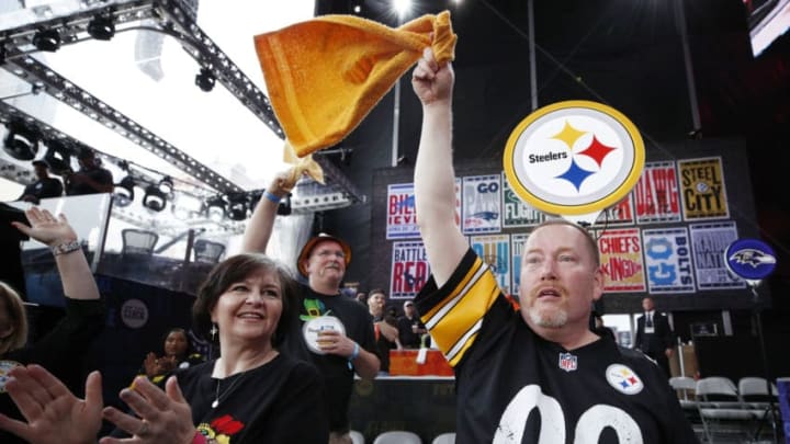NASHVILLE, TN - APRIL 25: A pair of Pittsburgh Steelers fans are seen prior to the first round of the NFL Draft on April 25, 2019 in Nashville, Tennessee. (Photo by Joe Robbins/Getty Images)