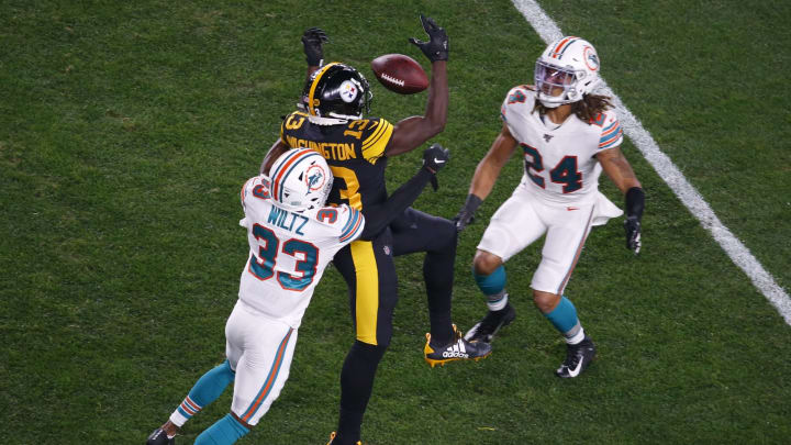 PITTSBURGH, PA – OCTOBER 28: Ryan Lewis #24 of the Miami Dolphins breaks up a pass in the first half against James Washington #13 of the Pittsburgh Steelers on October 28, 2019 at Heinz Field in Pittsburgh, Pennsylvania. (Photo by Justin K. Aller/Getty Images)
