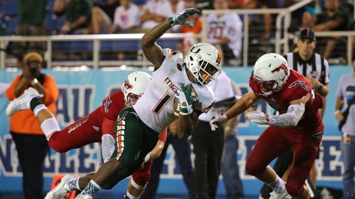 BOCA RATON, FL – SEPTEMBER 11: Artie Burns #1 of the Miami Hurricanes makes a catch during a game against the Florida Atlantic Owls at FAU Stadium on September 11, 2015 in Boca Raton, Florida. (Photo by Mike Ehrmann/Getty Images)