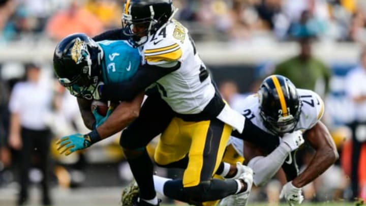 JACKSONVILLE, FL – NOVEMBER 18: Carlos Hyde #34 of the Jacksonville Jaguars is brought down by Sean Davis #21 of the Pittsburgh Steelers and Coty Sensabaugh #24 of the Pittsburgh Steelers during the first half at TIAA Bank Field on November 18, 2018 in Jacksonville, Florida. (Photo by Julio Aguilar/Getty Images)