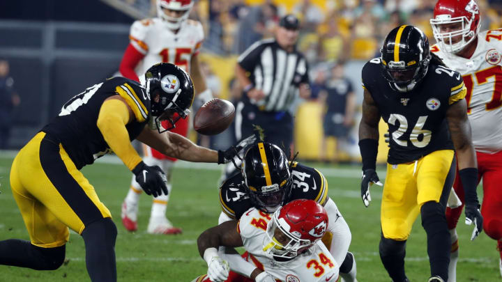 PITTSBURGH, PA – AUGUST 17: Terrell Edmunds #34 of the Pittsburgh Steelers strips the ball from Carlos Hyde #34 of the Kansas City Chiefs in the first half during a preseason game at Heinz Field on August 17, 2019 in Pittsburgh, Pennsylvania. (Photo by Justin K. Aller/Getty Images)