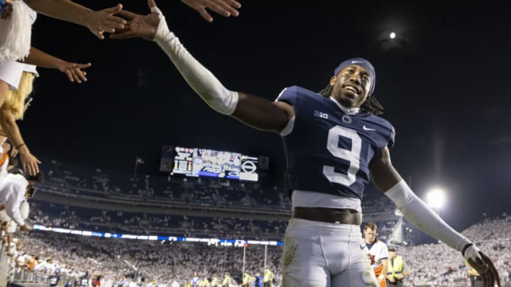 STATE COLLEGE, PA - SEPTEMBER 18: Joey Porter Jr. #9 of the Penn State Nittany Lions celebrates with fans after the game against the Auburn Tigers at Beaver Stadium on September 18, 2021 in State College, Pennsylvania. (Photo by Scott Taetsch/Getty Images)