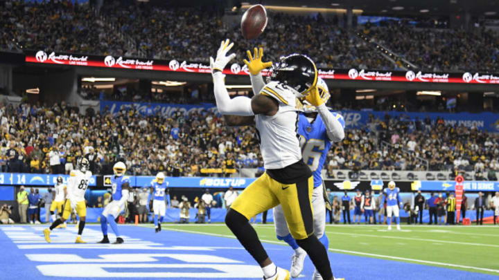 INGLEWOOD, CALIFORNIA - NOVEMBER 21: Diontae Johnson #18 of the Pittsburgh Steelers catches the ball for a touchdown as Asante Samuel Jr. #26 of the Los Angeles Chargers defends in the second quarter in the game at SoFi Stadium on November 21, 2021 in Inglewood, California. (Photo by Kevork Djansezian/Getty Images)